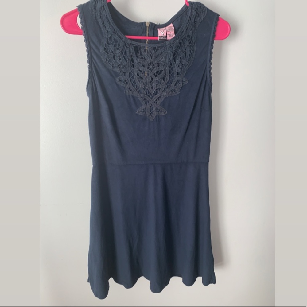 Navy dress with lace details.